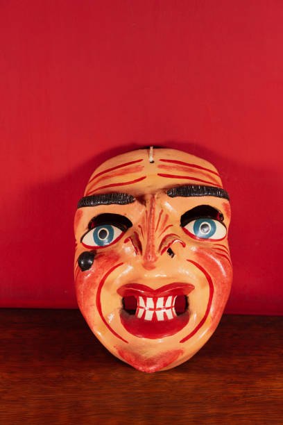 istock Typical Mask of Cuzco with red background 1393904975