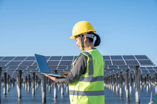 istock A female engineer works with a computer in a solar power station 1393908151