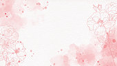 istock pink watercolor splash background with line art rose 1393912497