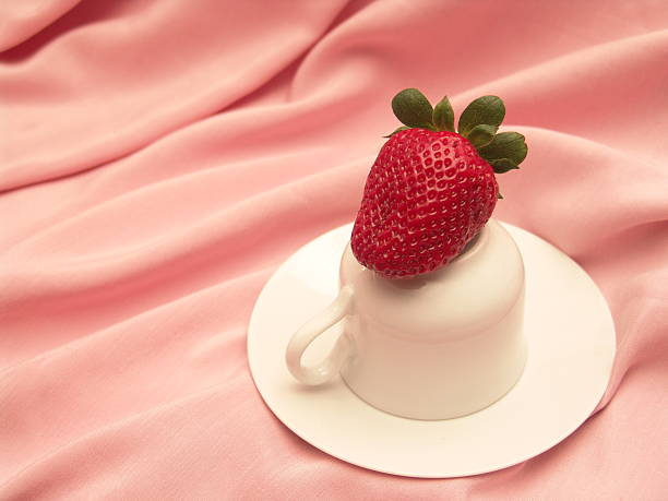 Strawberry on a cup stock photo