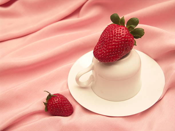 Strawberry on a cup stock photo