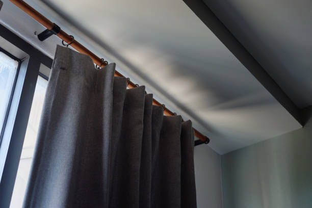 istock UV resistant gray curtains installed in the bedroom. 1393916395
