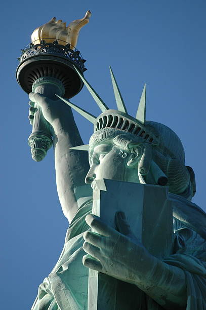 istock Lady Liberty-up close and personal-sunlight on fface 139391644