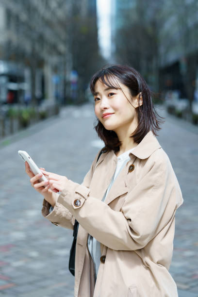 istock Woman walking in the business district 1393917698