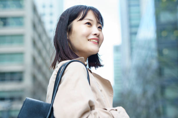 istock Woman walking in the business district 1393917743