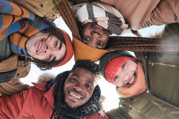 istock Happy Young Friends On Winter Day 1393917745