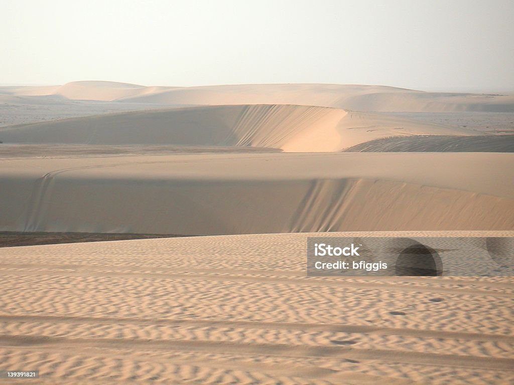 Sand dunes, Qatar Sand dunes at twilight in Qatar 4x4 Stock Photo