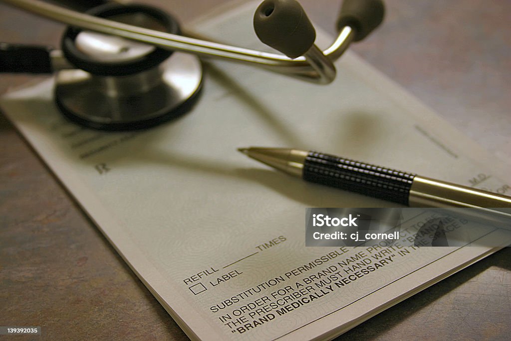 Script 1 Prescription pad with pen and scope Healthcare And Medicine Stock Photo