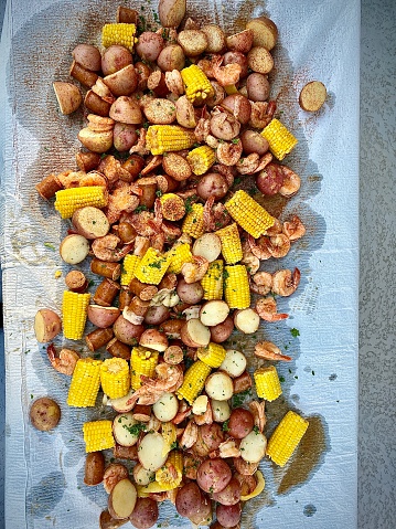 Low country boil with shrimp, corn, potatoes and pork sausage.