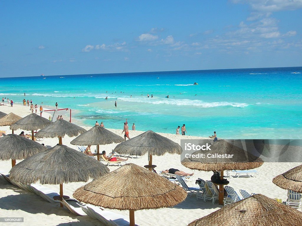 A lot of tourism occurs on Cancun Beach, New Mexico  Shot taken on the beach in Cancun. Mexico Beach Stock Photo