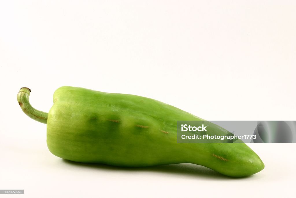 Cubanelle Pepper An isolated cubanelle pepper, which is both green and hot. Close To Stock Photo