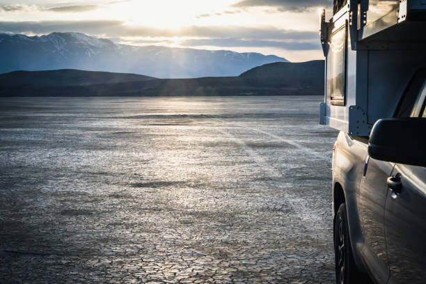 istock Truck Camper in Desert at Sunset 1393929117