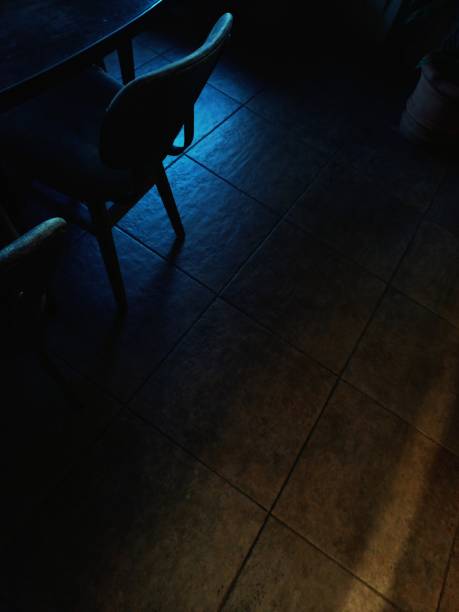 Chair In the dark cafe against blue light