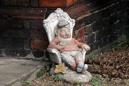 Gnome sleeping in a chair