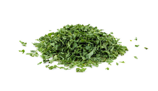 istock Dried parsley isolated on a white 1393931575