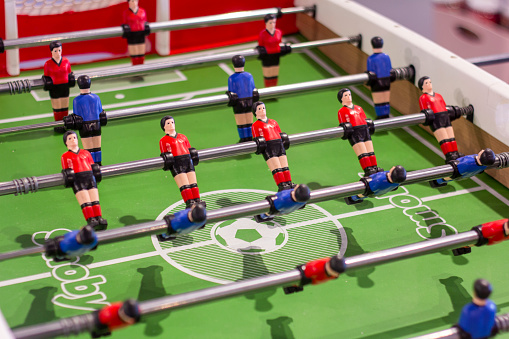 Figures on a soccer foosball table