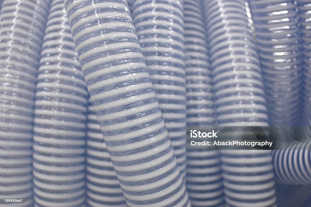 Water Pipe Texture Texture image of water pipes one strip of pipe in foreground in focus with background of same kind of pipe, Backgrounds Stock Photo