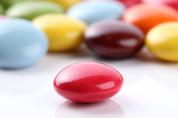 Colorful chocolate coated candy isolated on a white background