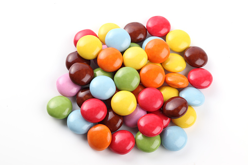 Colorful chocolate coated candy isolated on a white background