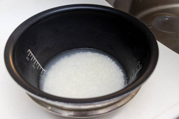 istock White rice grains soaked in water 1393939187