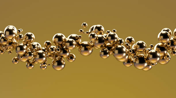 istock Abstract flying spheres on gold colored background 1393941262