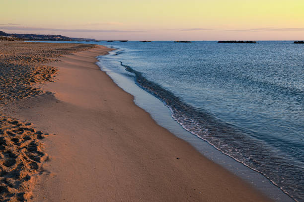 beach by the sea at sunrise