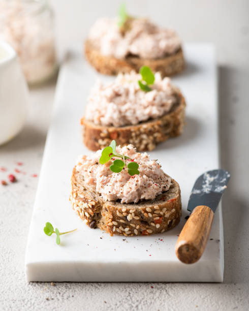 bruschetta with tuna pate, fish rillettes, sandwich bruschetta with tuna pate, fish rillettes, sandwich tuna pate stock pictures, royalty-free photos & images