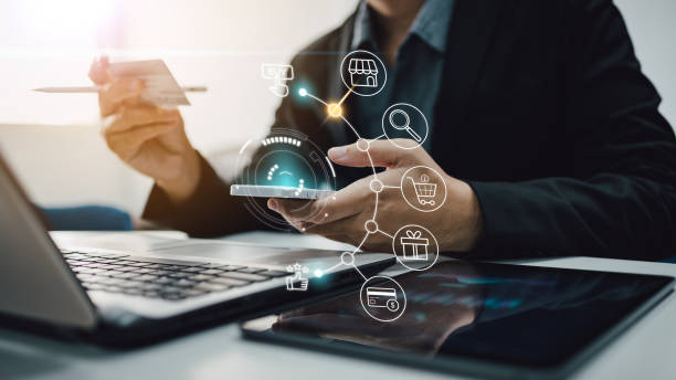 istock Businessman with mobile smartphone in hand paying online shopping on virtual interface global network. Online banking and digital marketing 1393949208