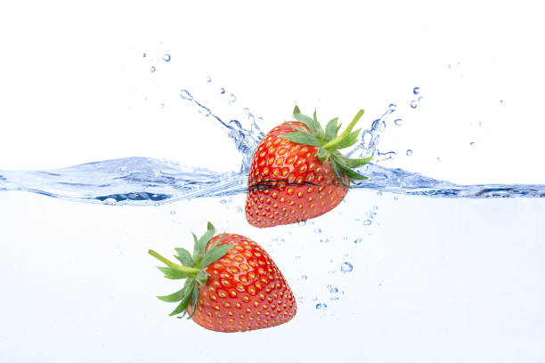 istock strawberry in water splash isolated on white 1393951457