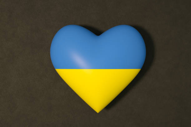 istock Ukraine flag in heart shape, support Ukraine 1393951558