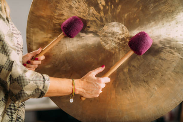 istock Sound Bath Therapy, Playing Gong 1393951799