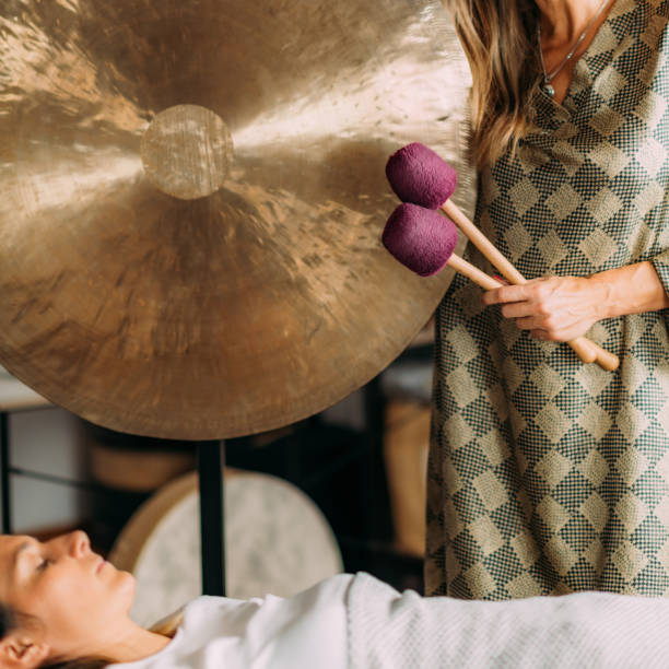 istock Sound Bath Therapy, Playing Gong 1393953200