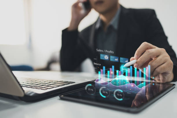 istock Business analyzing big data screen and economic growth with financial diagram graph interfaces. Concept of virtual dashboard technology digital marketing and global network connection. 1393953202