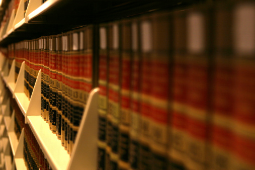 Interior of a large modern library with bookshelves.Waterloo University,Canada