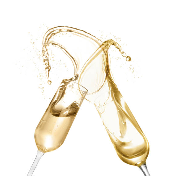 istock Clinking glasses of sparkling wine with splash on white background 1393957803