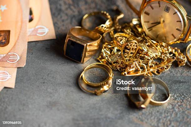 Old And Broken Jewelry And On Euro Banknotes On Dark Background Sell Gold For Money Concept Stock Photo - Download Image Now