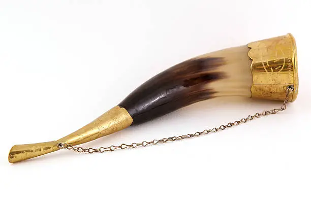 Drinking horn with brass accents