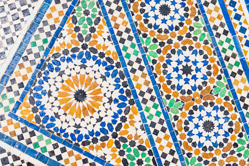 Traditional Moroccan mosaic pattern, cut out of colourful  pieces of ceramic tiles