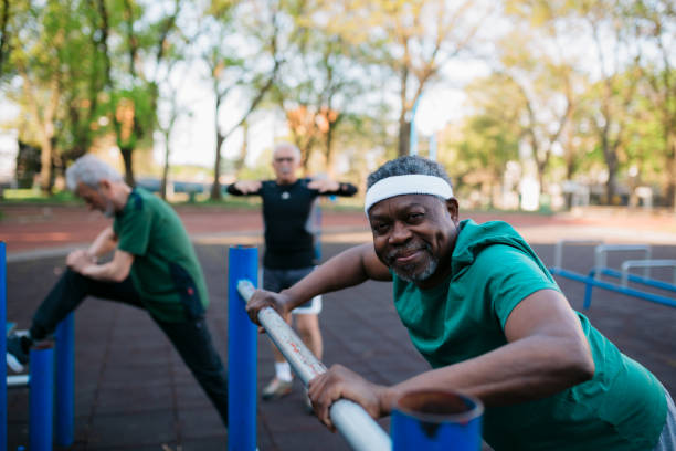 istock Senior man warming up his muscles with light exercises 1393972038