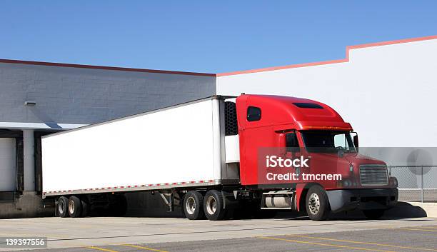 Red Truck With Trailer Attached In Parking Lot Stock Photo - Download Image Now - Semi-Truck, Loading Dock, Truck