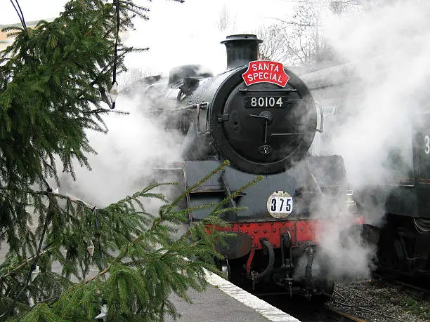 Santa Special steam locomotive. A UK British steam engine that is used as the "Santa Special" train at Christmas for kids. The Santa Special sign can be removed in Photoshop.