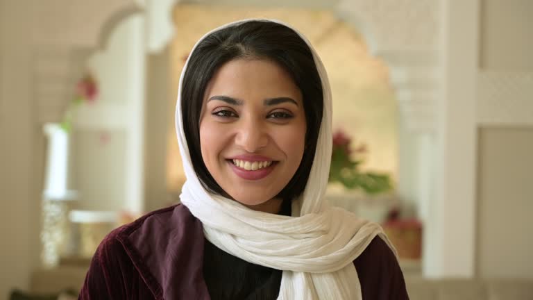 Close-up of young Saudi woman in traditional clothing