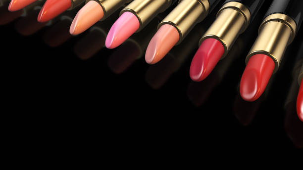 istock Colorful lipstick on black background 1393983475
