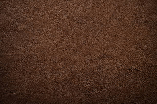 istock dark brown natural leather texture. vintage background 1393984312