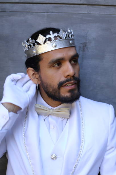 istock Exotic king with white outfit and silver jewelry 1393984594