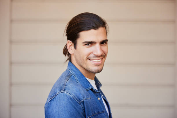 istock A young Argentinian man is smiling at the viewer. 1393986029