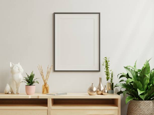 istock Empty frame on cabinet in living room interior on empty white wall background. 1393986919