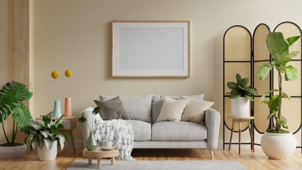 istock Mock up poster frame in modern interior with sofa and accessories in the room. 1393986952