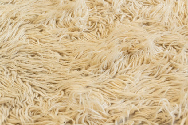 istock Close up woolen textile, soft and fluffy carpet 1393987328