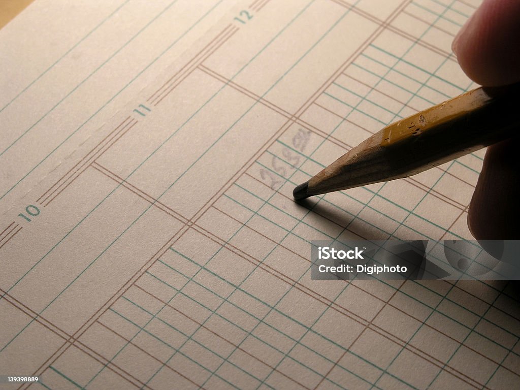 Ledger Entry - Dull Pencil Normally you think of "sharpen your pencils" for "creative accounting."  This is the OPPOSITE!  Dull pencil, uncreative, just slogging along, going throught the motions...   (Best focus on pencil and paper in center of frame) Architectural Column Stock Photo